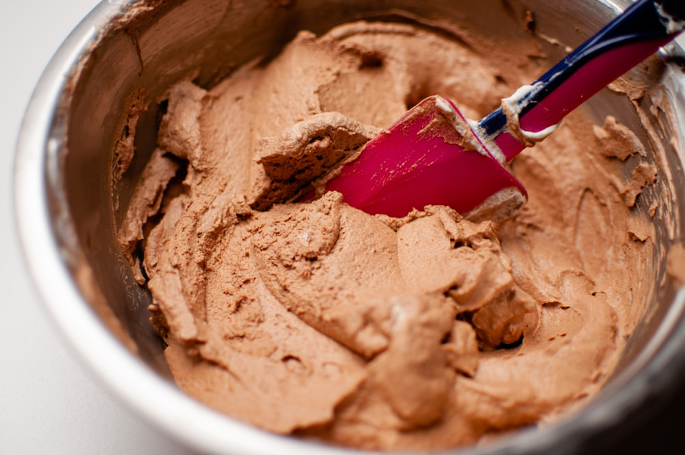 A silicone spatula in a mixing bowl